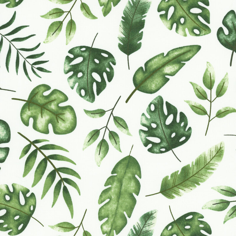 fabric with tossed tropical leaves on a flat white background