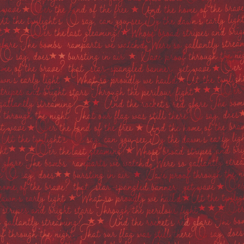red fabric covered in the lyrics to the star spangled banner