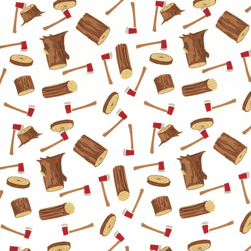 fabric featuring tossed logs and wood rounds with axes on a light cream background