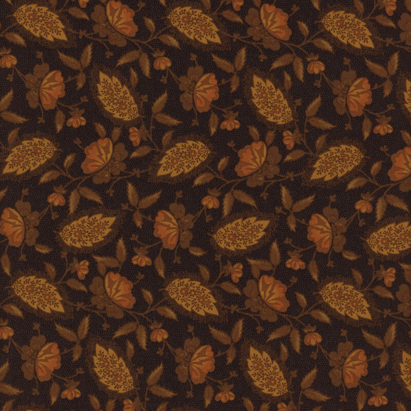 Fabric with vines, orange flowers and paisley leaves on a solid black background
