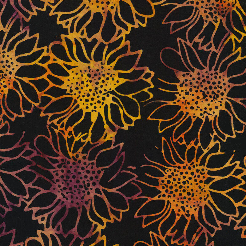 Black fabric with mottled yellow and orange sunflowers across it