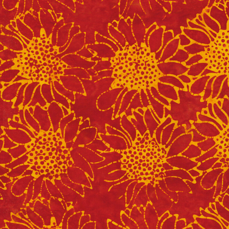 Bright red/orange fabric with tossed large sunflowers in a mottled yellow watercolor look