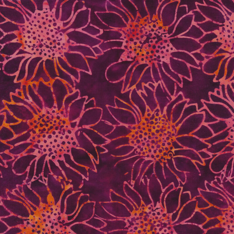 Purple mottled fabric with tossed large sunflowers in a mottled pink watercolor look