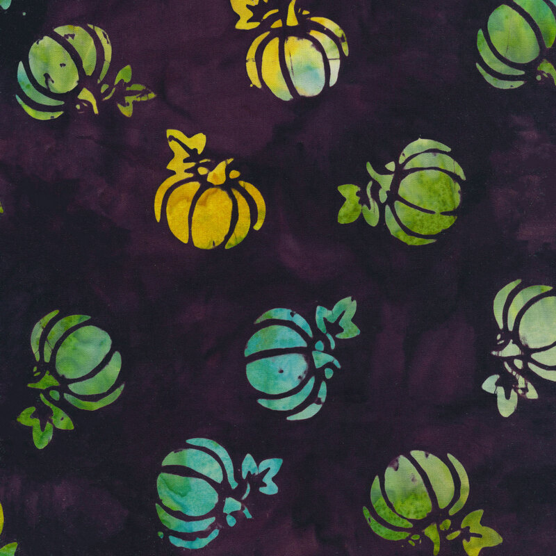 dark purple mottled fabric with tossed pumpkins spaced evenly apart with a teal and orange mottled watercolor look
