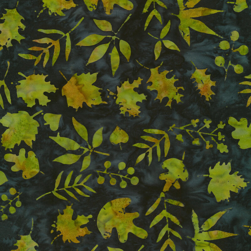 dark blue/teal mottled fabric with tossed leaves all over in a mottled green and orange watercolor look