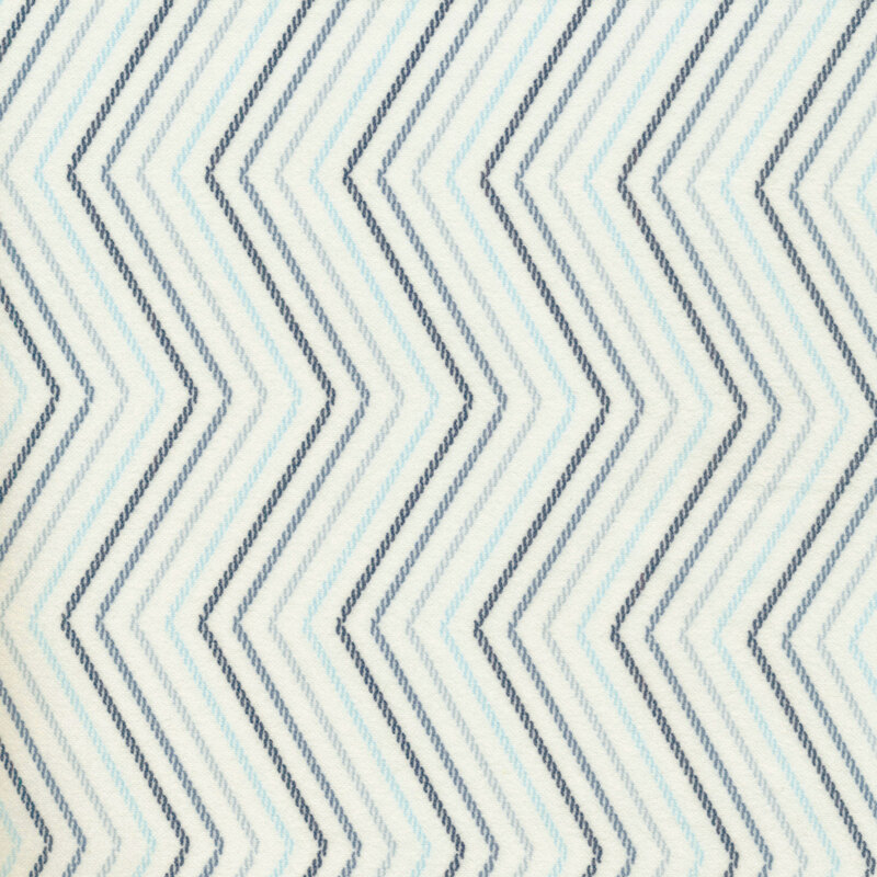 white flannel with varying blue zig zags
