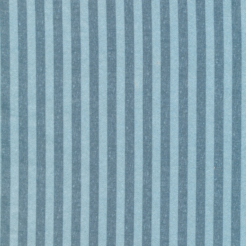flannel with alternating stripes of lighter and medium blue