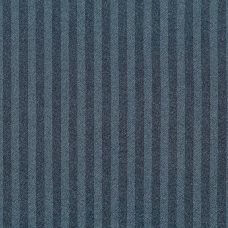 flannel with alternating stripes of dark and medium blue