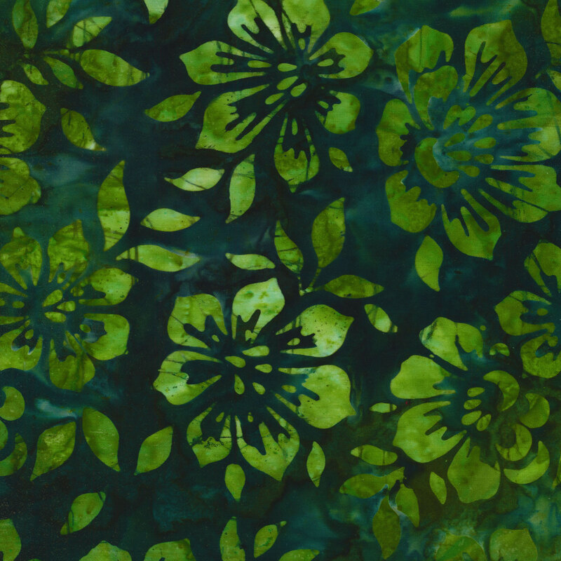 Fabric with green mottled flowers on a dark teal green background