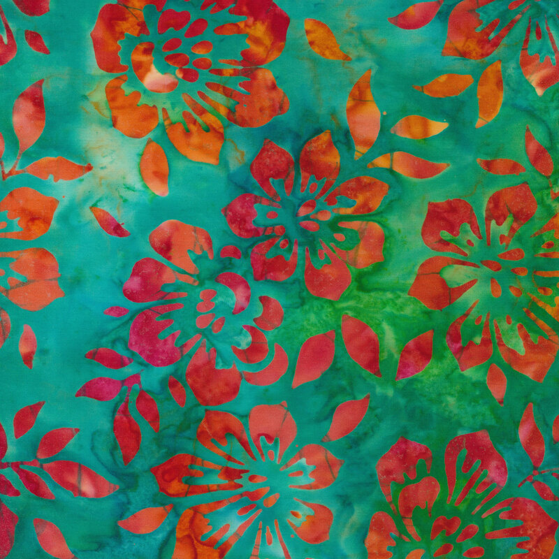Fabric with orange and yellow flowers on a mottled aqua green background