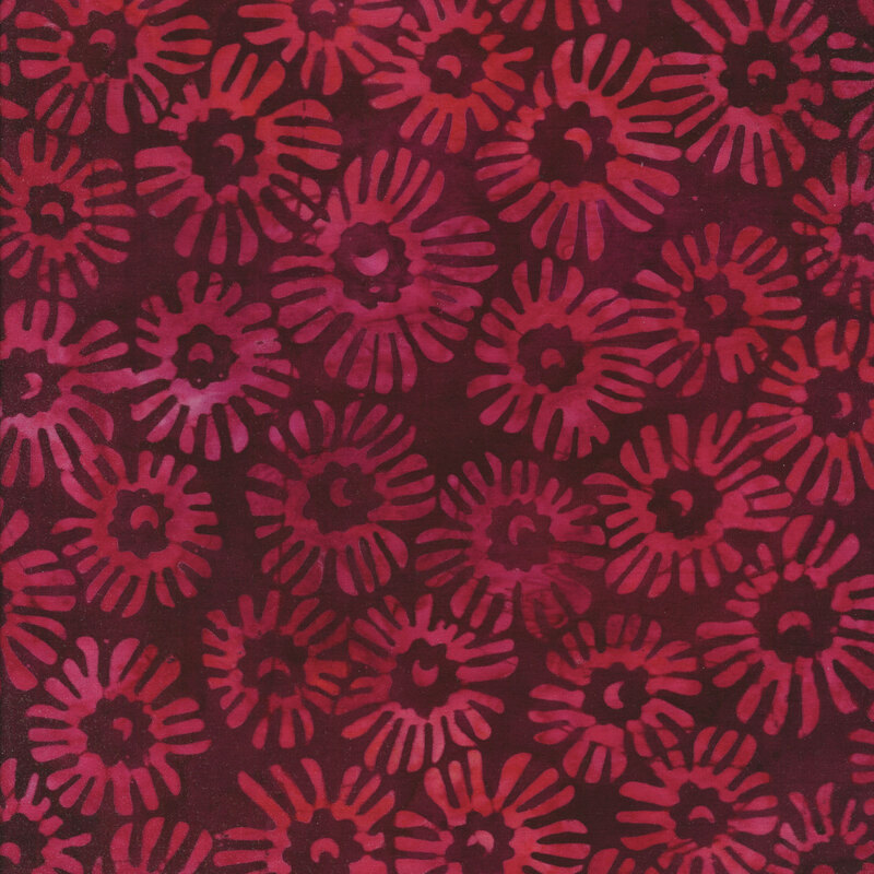 Fabric with abstract pink flowers on a magenta mottled background