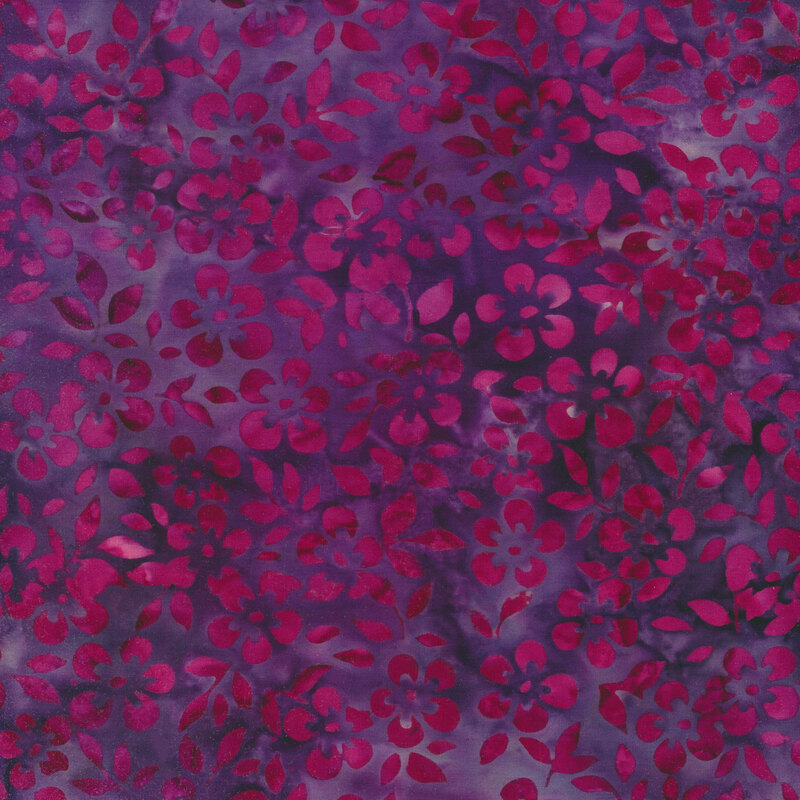 Fabric with packed purple magenta flowers on a rich dark purple background