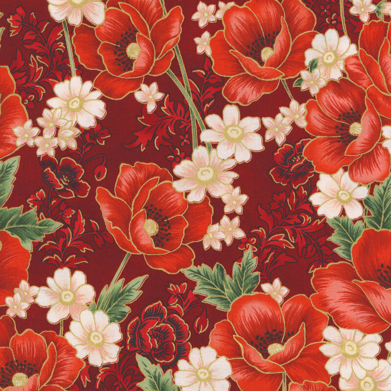 Red floral fabric decorated with reddish orange poppies and light pink daisies