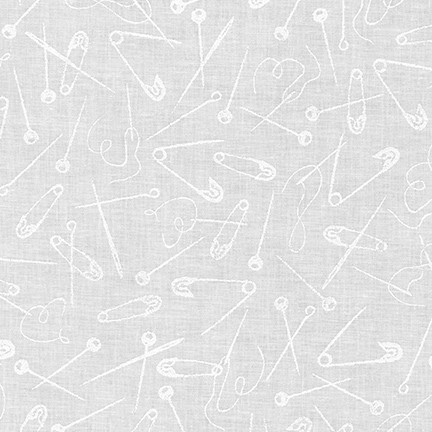 digital image of fabric with pattern of tossed white safety pins, sewing pins, and needles on a white background