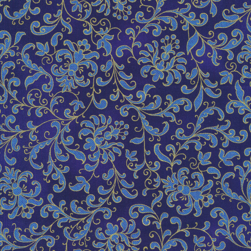 Dark blue fabric with light blue floral filigree and swirls all over, edged with gold metallic accents