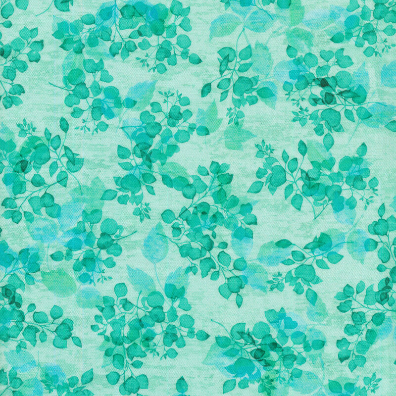 bright aqua fabric covered in a leafy print