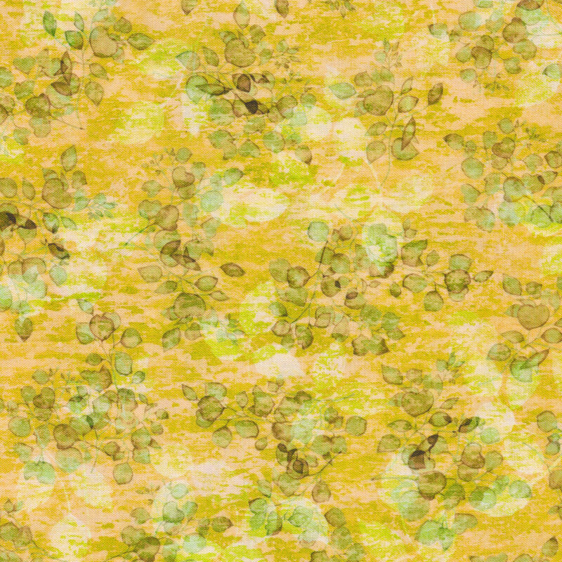 yellow and green fabric with a green leafy print