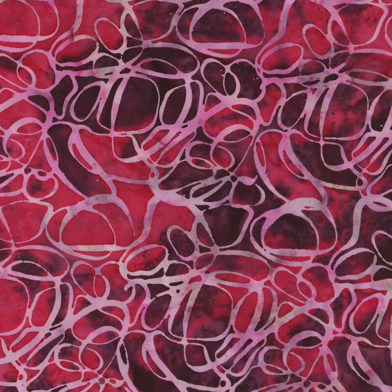 Scan of fabric featuring pink modern loops and circles on a mottled magenta background