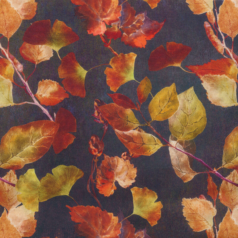 Dark grey fabric covered in autumn leaves ranging in shape and color