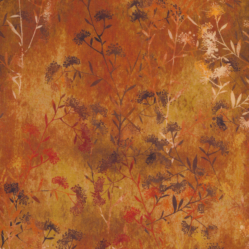 Rusty mottled orange fabric with brown, white, and red milkweed patterns scattered across it