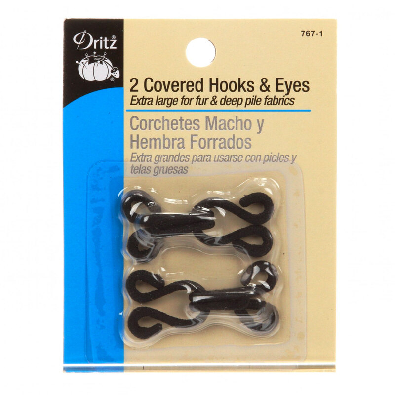 package of two pairs of large hook and eyes covered in black fabric