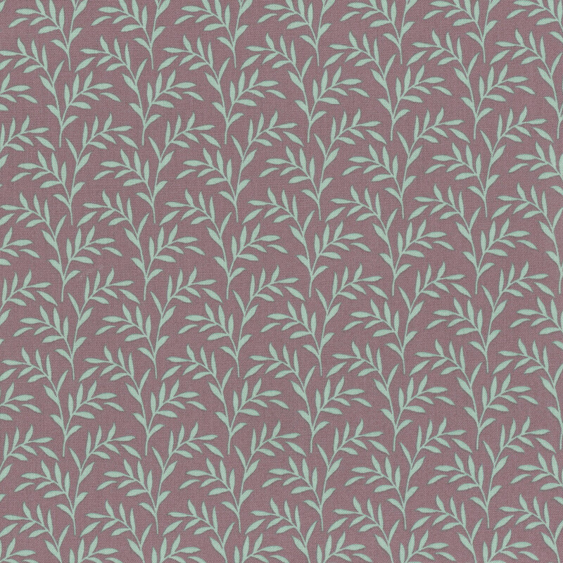 mauve fabric with light blue olive branches and leaves scattered across it