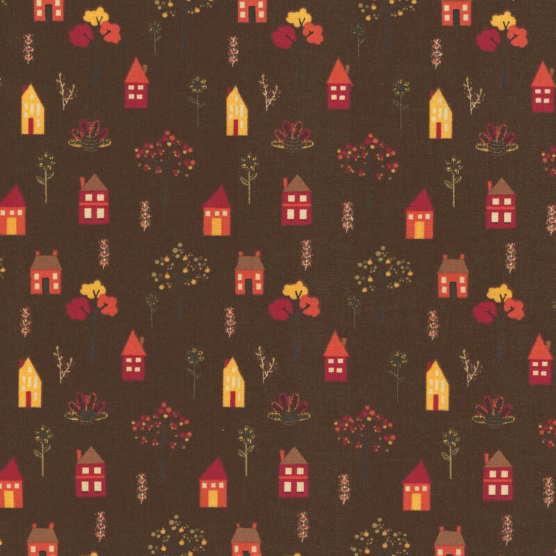 fabric featuring adorable autumnal houses with fall trees, turkeys and sunflowers on a rich brown fabric