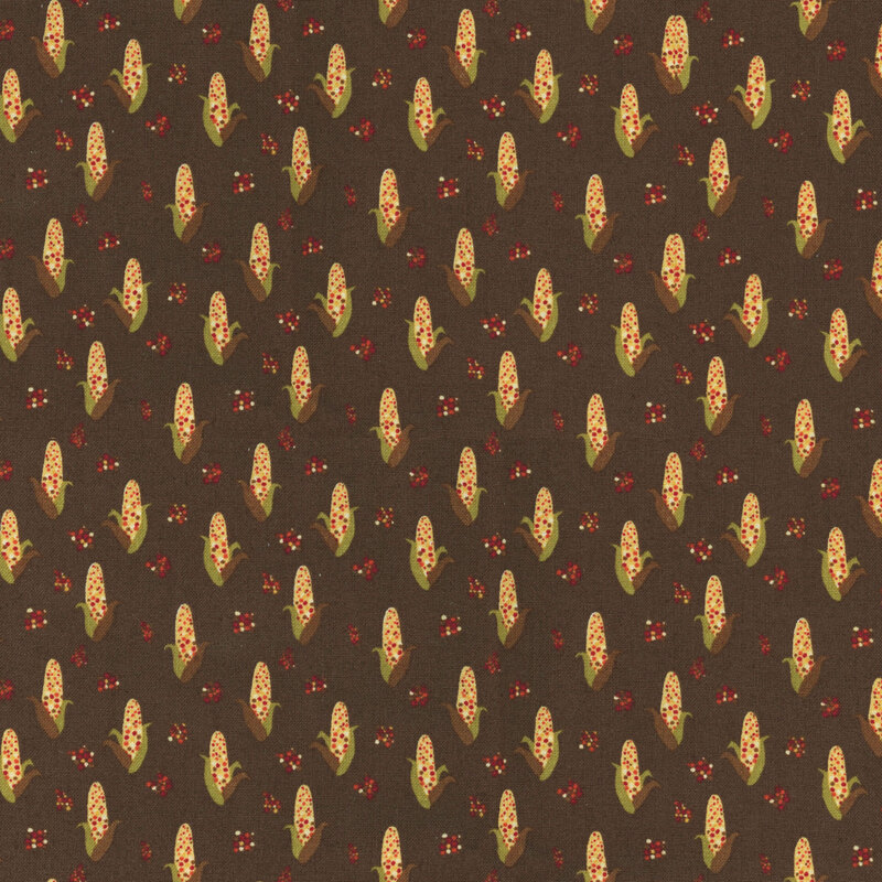 fabric featuring adorable ears of corn on a solid warm brown background