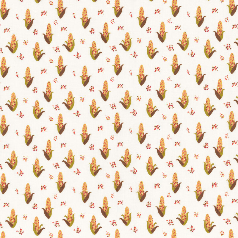 fabric featuring adorable ears of corn on a cream background