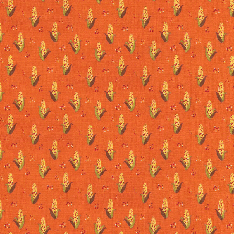 fabric featuring adorable ears of corn on an orange background