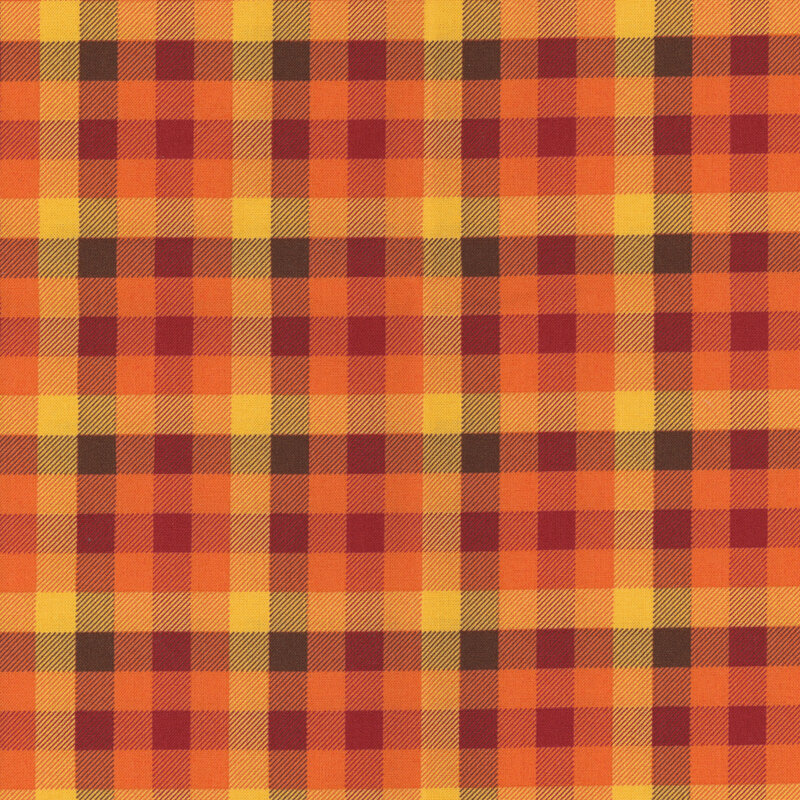 fabric featuring lovely golden yellow, brown, and burnt orange plaid print