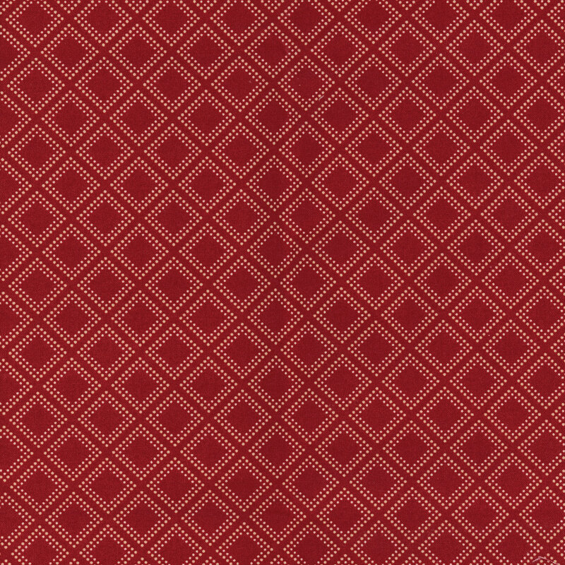 fabric cream colored dots forming a diamond on a bold red background
