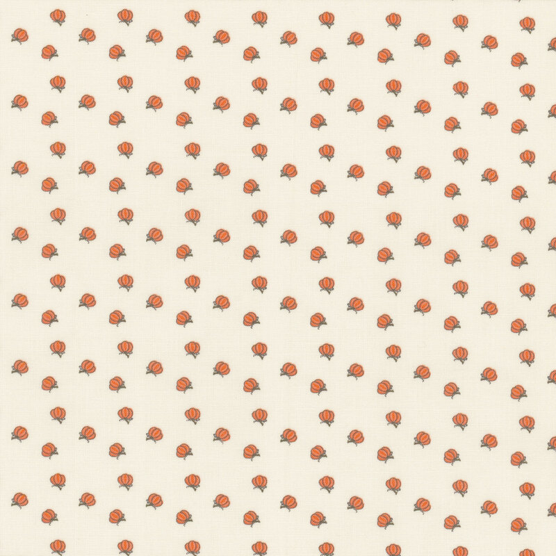 fabric with tossed ditsy pumpkins on a solid lovely cream background