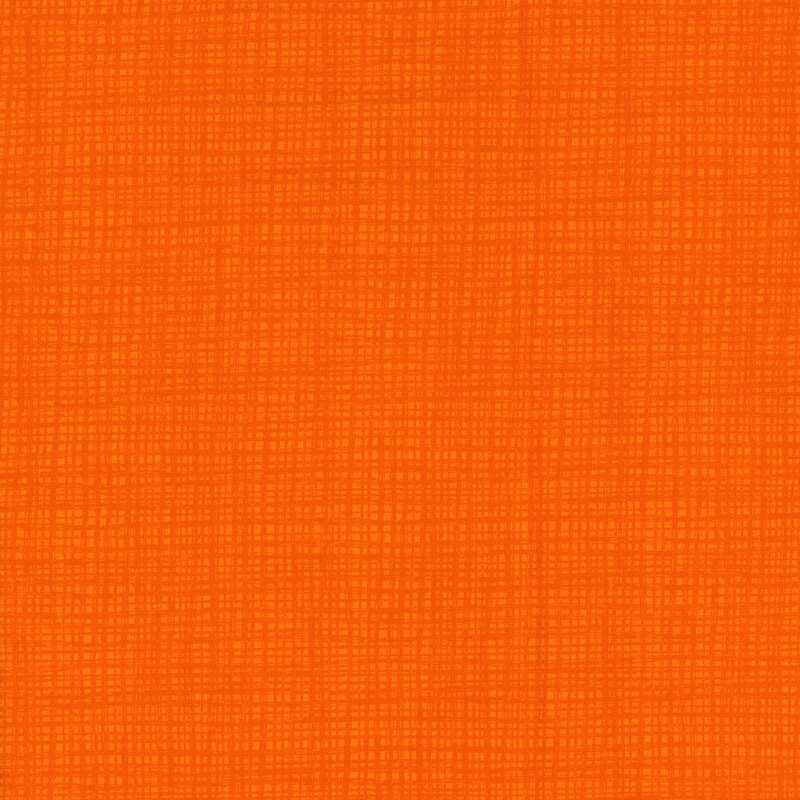 A tonal orange fabric with a textured background