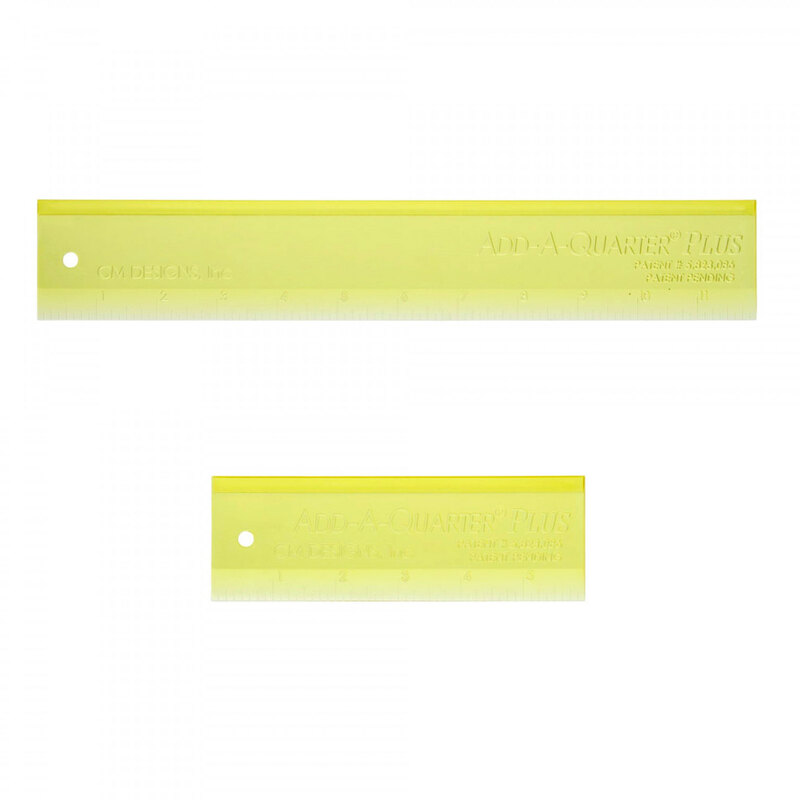A photo of two yellow rulers, one measuring 12