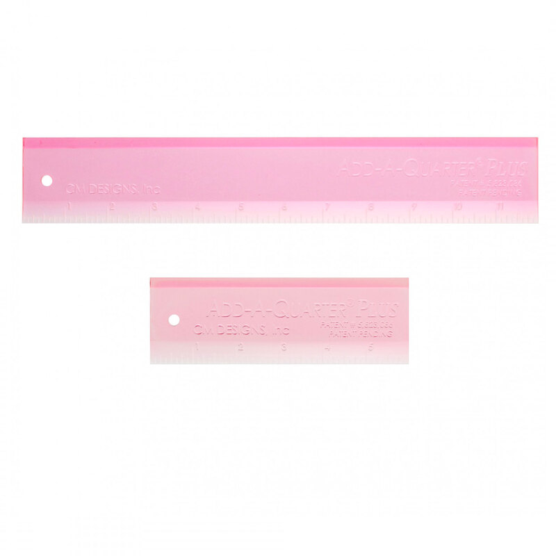 A photo of two pink rulers, one measuring 12