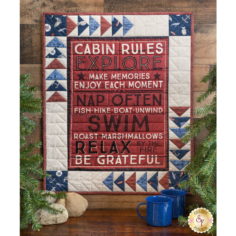 An On Lake Time Cabin Rules Wall Hanging.
