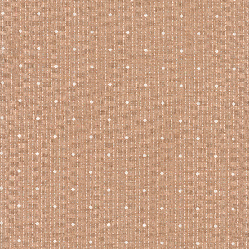 fabric with diamonds and dots in cream on a lovely tan background
