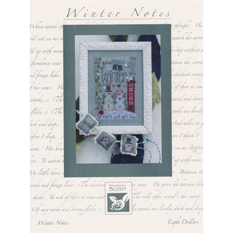 Picture of the winter notes cross stitch pattern, showing the finished project with various winter phrases and winter motifs