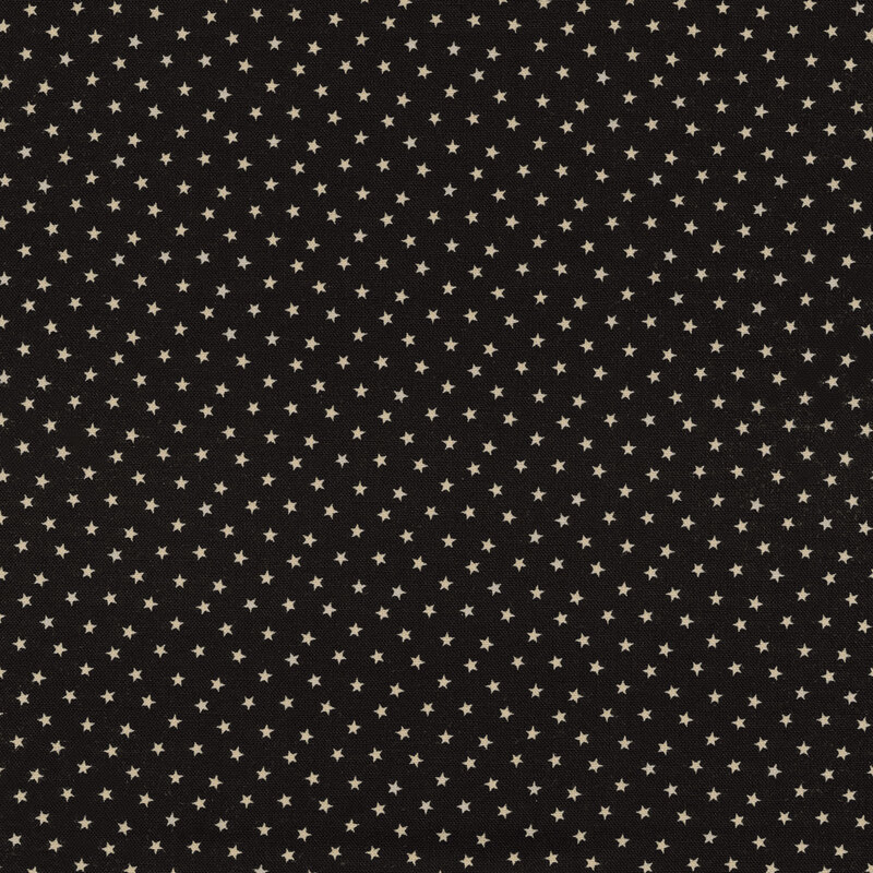 Black fabric with tiny cream stars across it