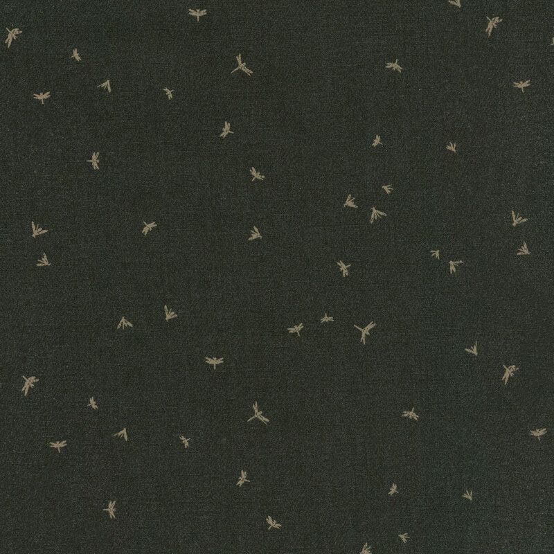 dark gray fabric with ditsy orange soaring dragonflies