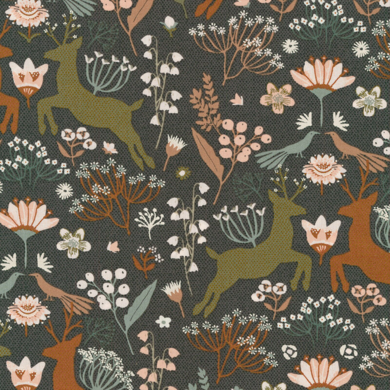 fabric with a dark gray background with deer, wildlife and white and pink flowers 