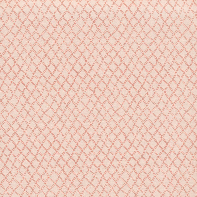 dusty rose colored fabric with a drawn cross hatch pattern