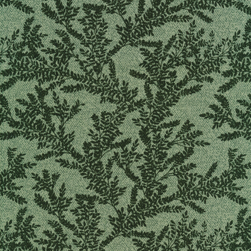 fabric with dark green foliage on a dusty dark green background