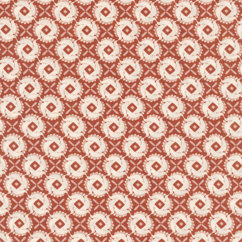 fabric with cream swirled abstract bird pattern with pink crosses on a dusty pink background.