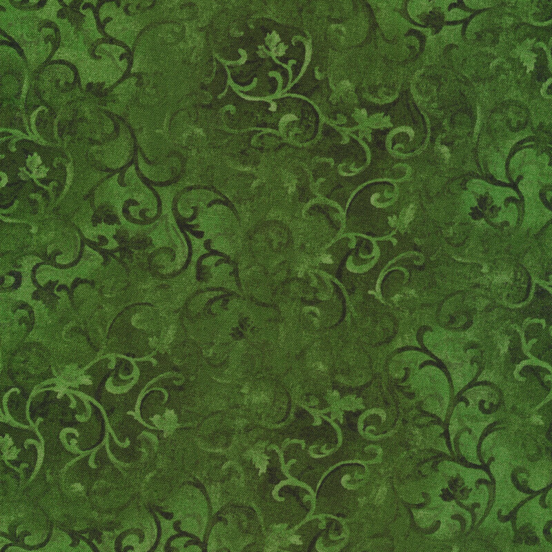 Tonal green mottled fabric with swirly vines