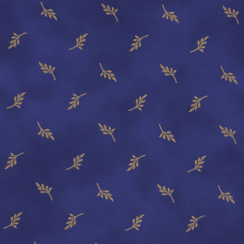 Fabric with royal blue mottled background with gold metallic leaf patterns