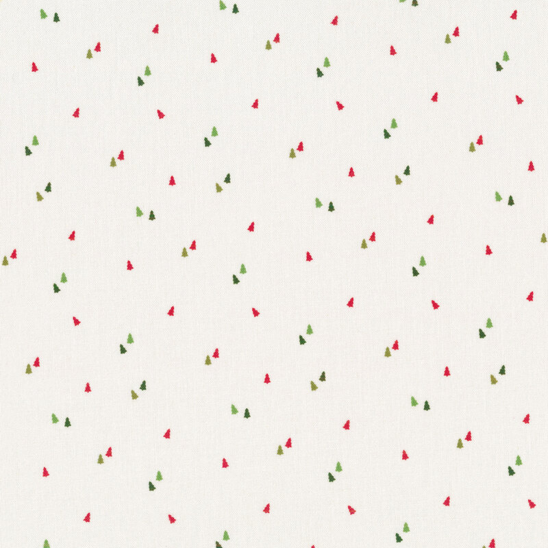 cream cotton fabric with tiny red and green evergreen trees scattered all over
