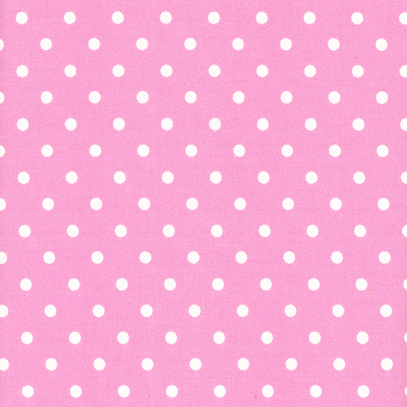 Bright pink fabric with white polka dots across it