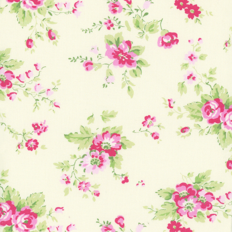 light green fabric with contrasting pink roses and light green leaves on it